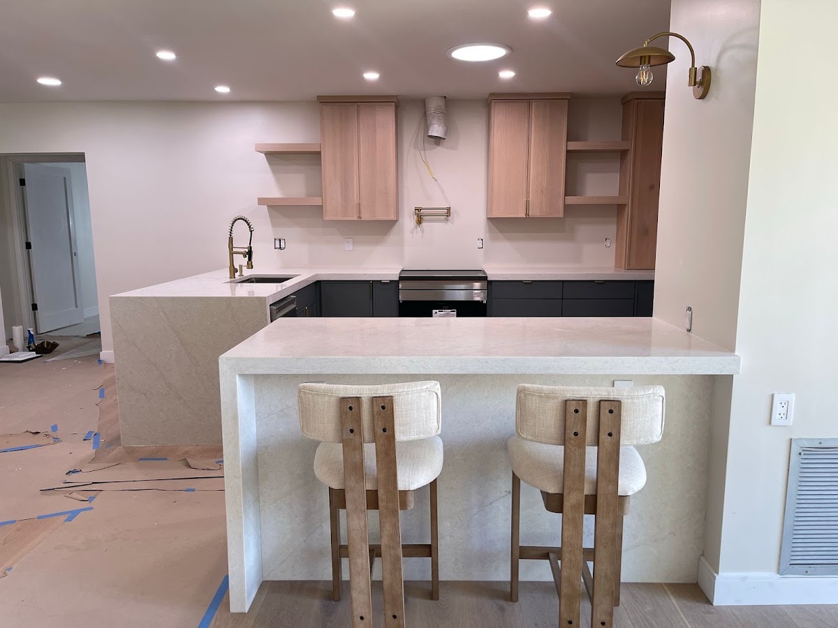 Kitchen cabinetry · Installation in progress: Two tones. One considered space.