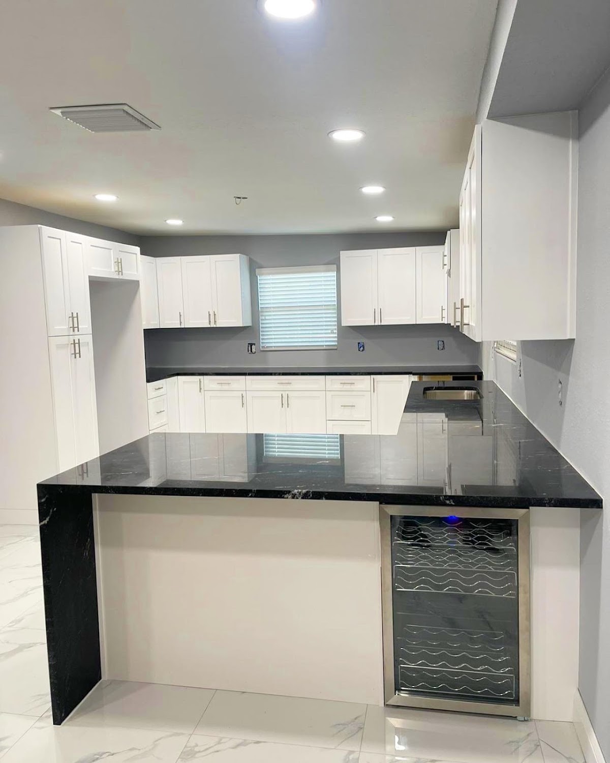 Kitchen cabinetry · Installation in progress: Clean lines, bold contrast.